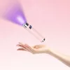 Roniki AI vezérelt pink mini UV lámpa állvánnyal - hordozható, tölthető